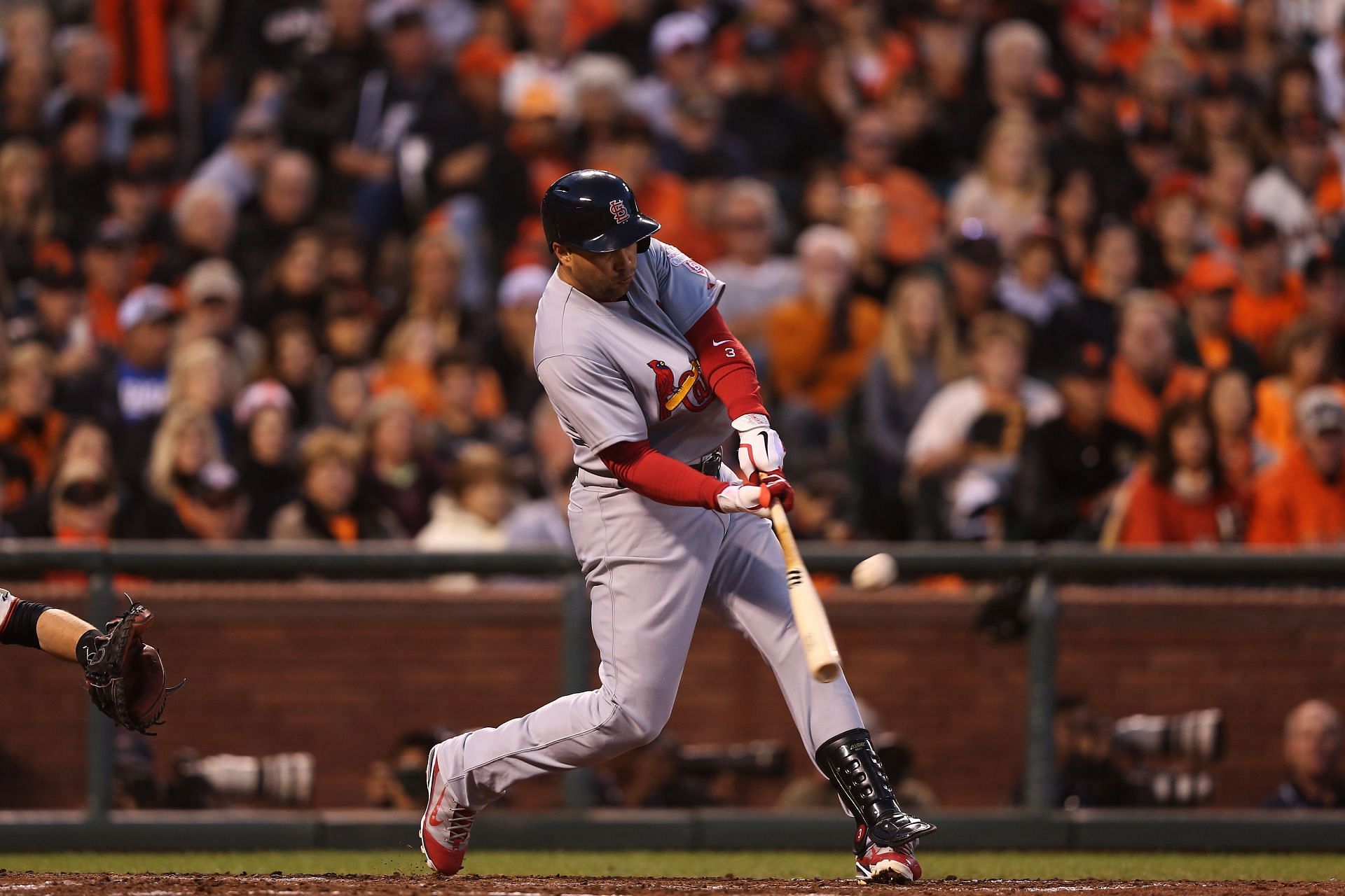 Carlos Beltran of the St. Louis Cardinals hits a two-run home run in the fourth inning during Game One of the National League Championship Series against the San Francisco Giants at AT&T Park on October 14, 2012, in San Francisco, California.
